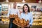 Woman owning bakery with husband holding just baked croissants