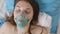 Woman in oxygen mask lying in bed, health problems, depression, fear disease