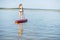 Woman paddleboarding on the lake