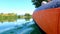 Woman paddling in inflatable kayak on Gacka river in Lika, Croatia.