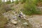 A woman panning for gold in northern bc