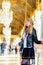 Woman in Paris, France. Young tourist girl admiring the views. French dressed style. Portrait soft bokeh backgrounds