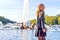 Woman in Paris, France. Young tourist girl admiring the views. French dressed style. Portrait soft bokeh backgrounds