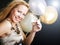 Woman on party holding ballons