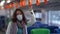 Woman passenger of suburban train, mandatory wearing mask at pandemic of covid 19