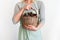 Woman Pastel Clothes Basket Hands Hold Pine Cones