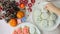 Woman pastry chef decorates gingerbread.