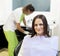 Woman patient at the dentist waiting to be checked up