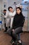 Woman patient standing on chair in neurology laboratory during clinical experiment