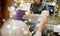 Woman paying money at store cash register