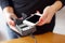 Woman paying with NFC technology on mobile phone