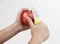 woman pealing apple with knife