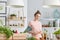 Woman peeling carrot