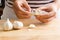 Woman peeling garlic