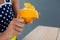 Woman peeling orange