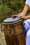 Woman percussionist hands playing a drum