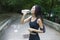 Woman with a perfect figure doing sports, fitness, drinking water