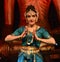 Woman performing Indian Bharatanatyam dance