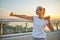 Woman performing a strength training exercise outdoors