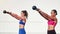 Woman, personal trainer and kettlebell in weightlifting for fitness, exercise or workout together outdoors. Women