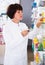 Woman pharmacist in pharmacy
