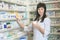 Woman pharmacist at the pharmacy place