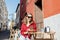 Woman with phone on the cafe terrace outdoors