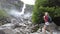 woman photographer at Foroglio waterfall