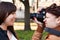 Woman photographer photographing the model