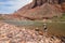 Woman photographing the Colrado River and inner canyon in the Grand Canyon.