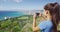Woman Photographing Waikiki Beach And Honolulu From Diamond Head State Monument