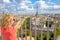 Woman photographs Eiffel Tower