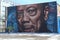 Woman Photographs Quincy Jones Mural in Chicago Illinois USA