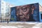 Woman Photographs Quincy Jones Mural in Chicago Illinois USA