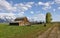 Woman photographs vintage barn