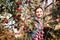 Woman picking ripe apples on farm. Farmer grabbing apples from tree in orchard. Fresh healthy fruits ready to pick on fall season