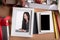 Woman picture in picture frame and blank smart phone and holiday