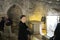 Woman pilgrim in The Church of the Holy Sepulchre, Christ`s tomb, in the Old City of Jerusalem, Israel