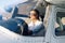 Woman Pilot Sitting in Cabin of Modern Aircraft.