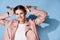 woman in pink jacket pigtails decoration fashion glamor modern style