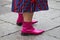 Woman with pink satin pointed shoes and blue and red skirt before Max Mara fashion show, Milan Fashion Week