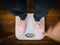 Woman with pink sneakers on bathroom weight scale