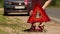 Woman Places A Red Emergency Stop Sign