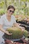 Woman planting succulent at little  home garden