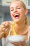 Woman with plate of spaghetti