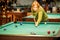 Woman play pool