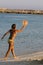 Woman playing beach tennis