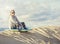 Woman Playing and boarding in the Sand Dunes