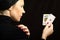 Woman with playing cards (black jack pair)