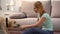 Woman playing with cute labrador dog with pet toy, domestic animal, best friend